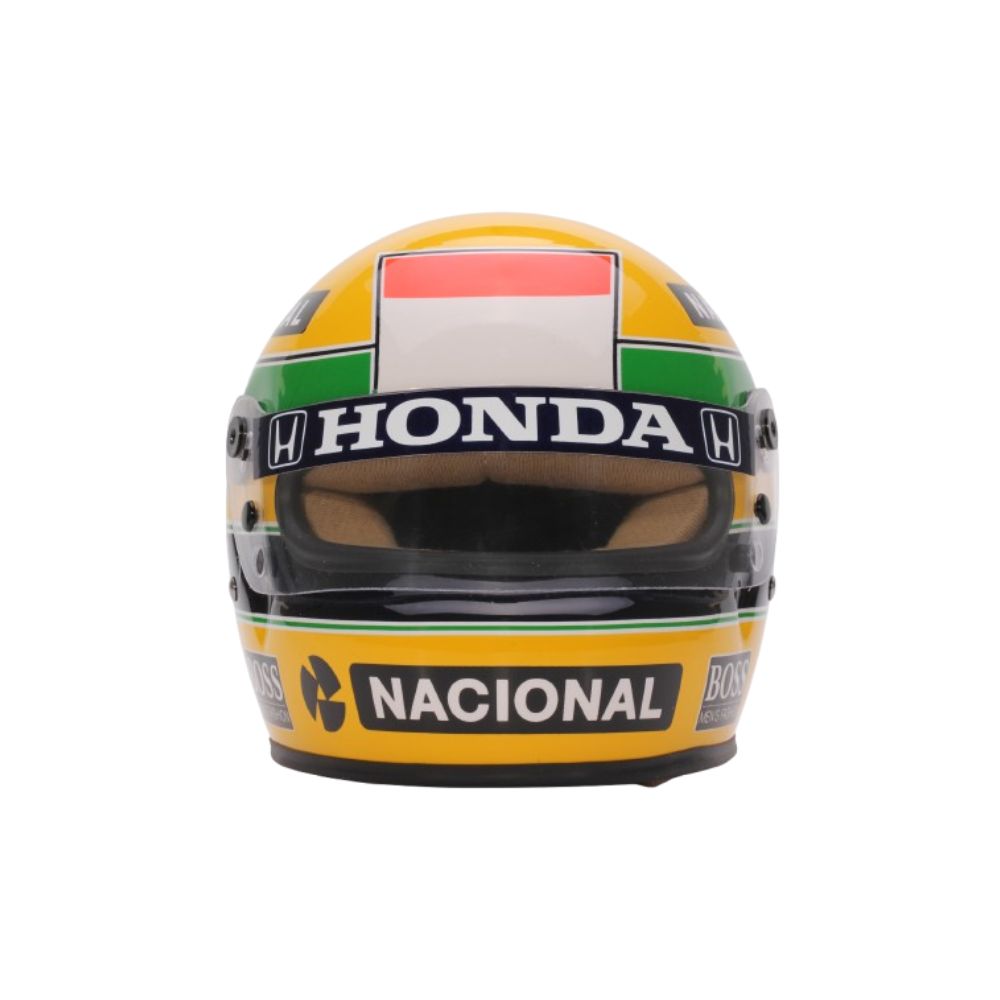 15607838902-88174-002-70299-002-mini-capacete-comemorativo-da-conquista-1o-campeonato-mundial-f1-1988-ayrt.jpg
